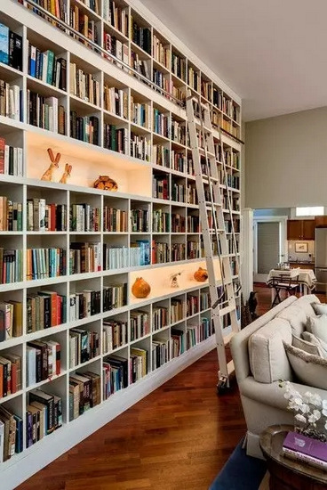 喜欢看书的家庭可以用书墙做背景墙