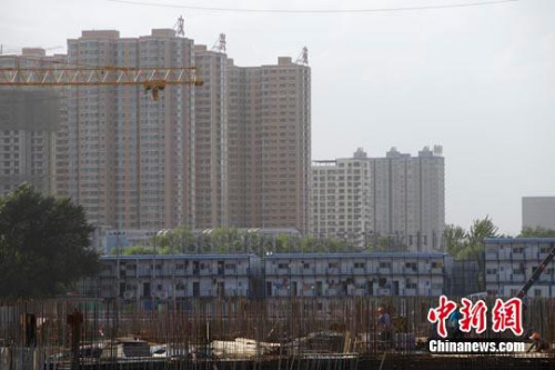 中国多地接连出台楼市调控新政 能否稳住房价