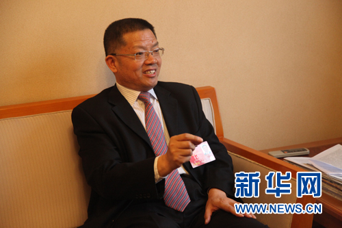 （全国人大代表、中国建筑股份有限公司总经济师鲁贵卿接受专访。杨森/摄）