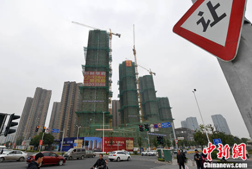 资料图:一处在建中的商品房 资料图:一处在建中的商品房